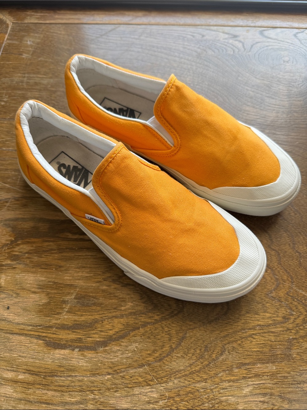 Vans Orange Canvas Slip-On Sneakers with White Trim